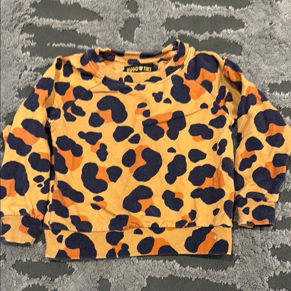 Hugo loves tiki leopard print sweatshirt
